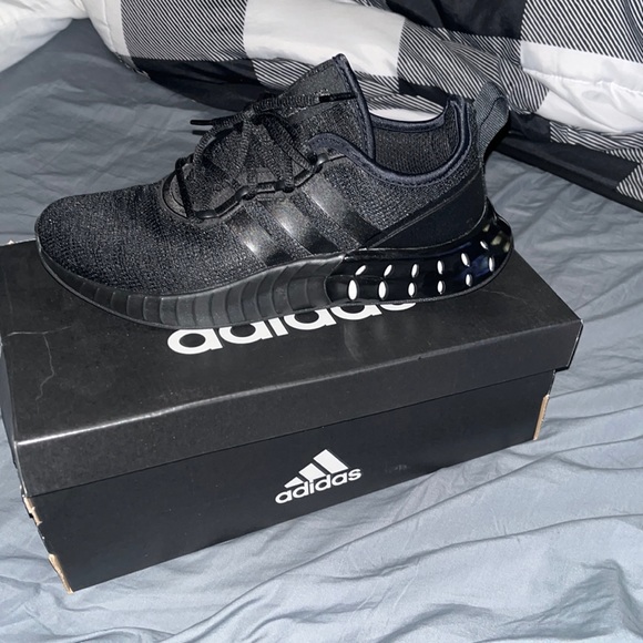 Adidas size 8.5 worn only once paid 90$ asking for $60 there to big for me. - Picture 1 of 3